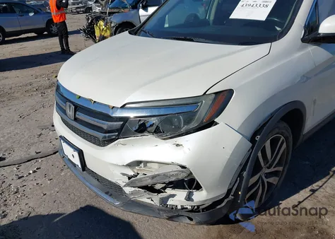 2016 Honda Pilot Touring z USA, uszkodzony, nr VIN 5FNYF6H96GB058259